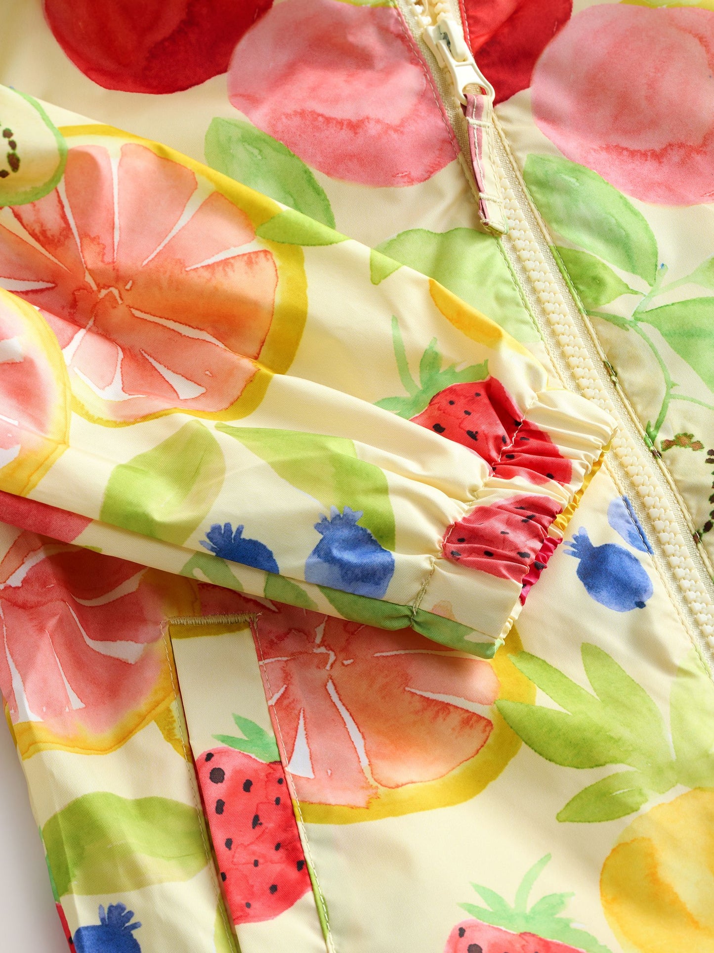 Yellow Fruit Shower Resistant Cagoule Jacket (3mths-7yrs)