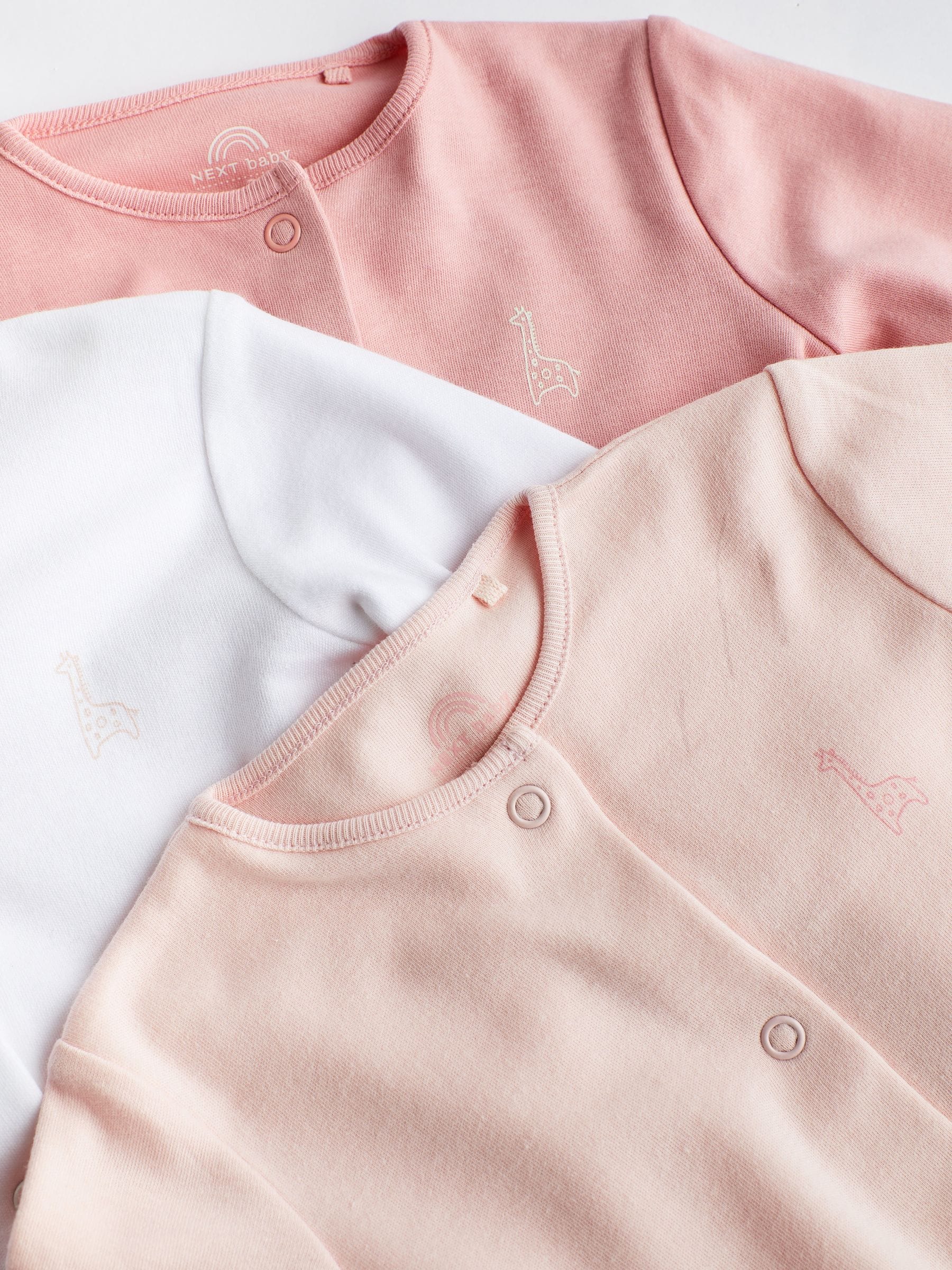 Pink/White 3 Pack Baby Sleepsuits (0-2yrs) image 3