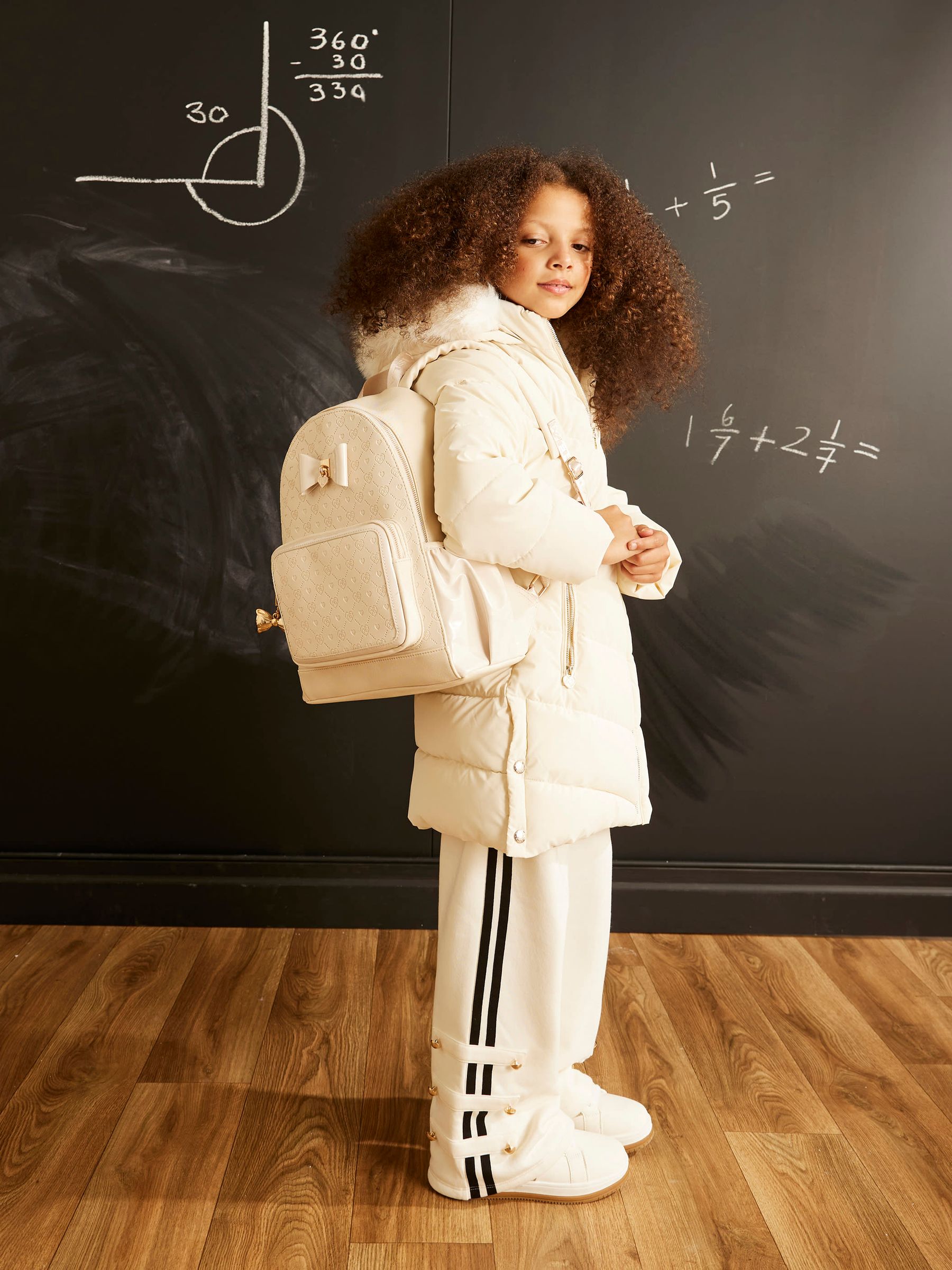 River Island Cream Embossed Bow Backpack image 1