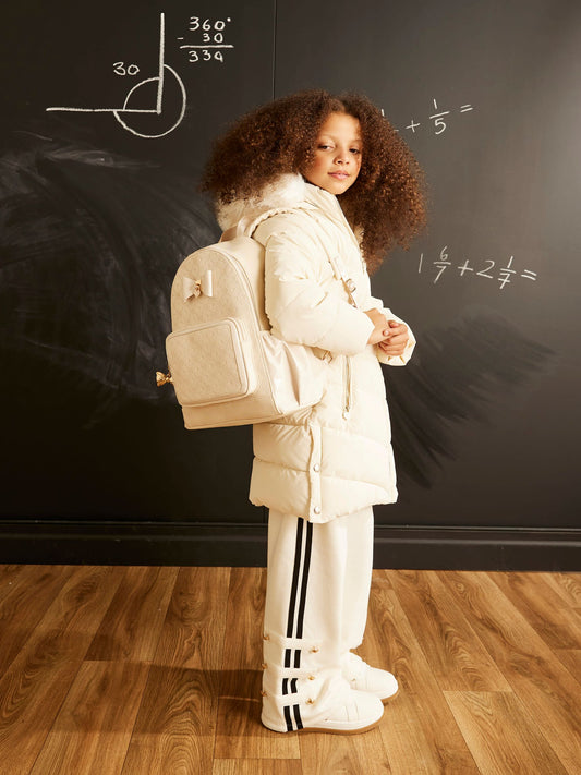 River Island Cream Embossed Bow Backpack image 1