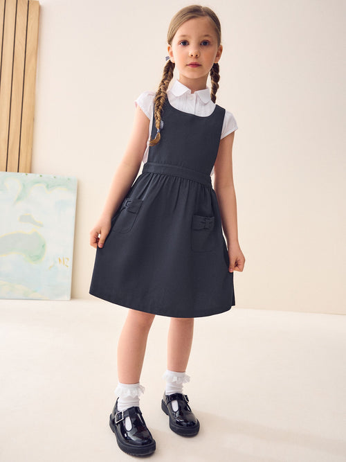 Navy Bow Pocket Detail School Pinafore Dress (3-14yrs) image 1