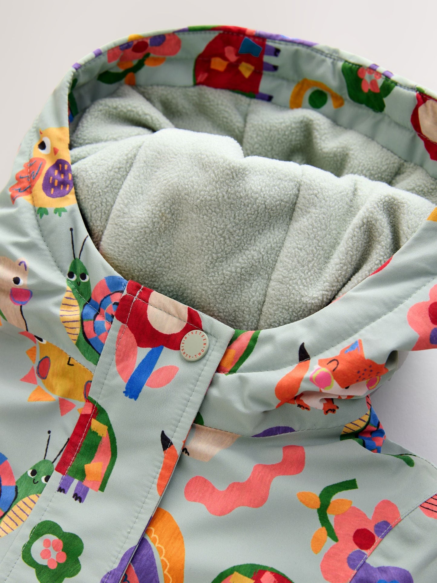 Green Character Waterproof Jacket (3mths-7yrs)