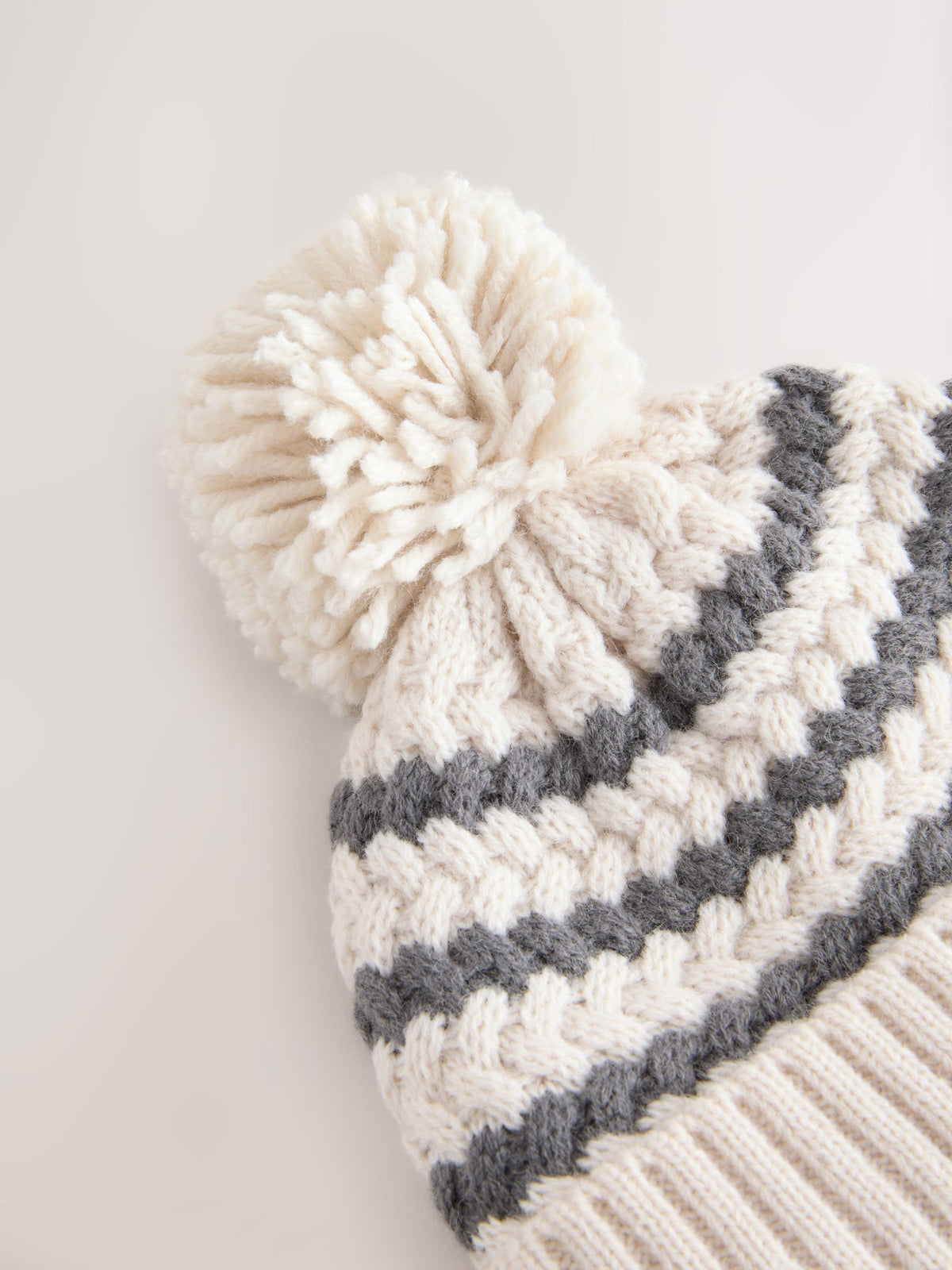 Monochrome Striped Baby Knitted Hat With Pom (0mths-2yrs) - image 2