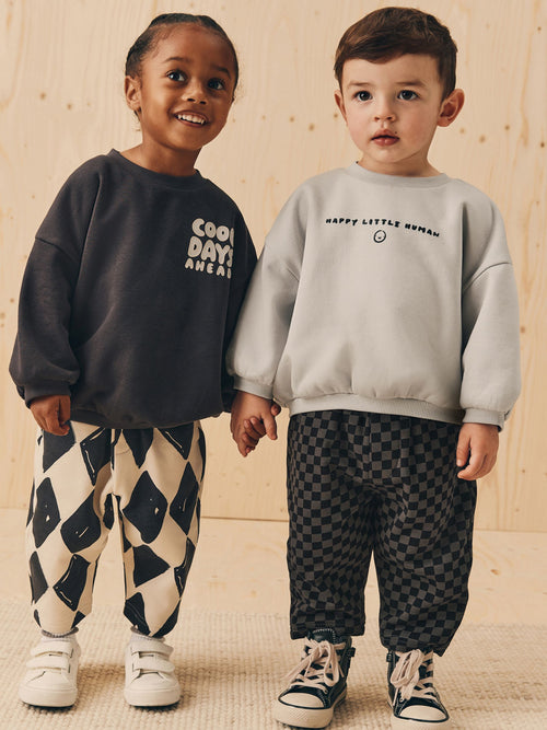 Black/White Printed 2 Pack Sweatshirt And Stripe Joggers Set (3mths-7yrs) image 1