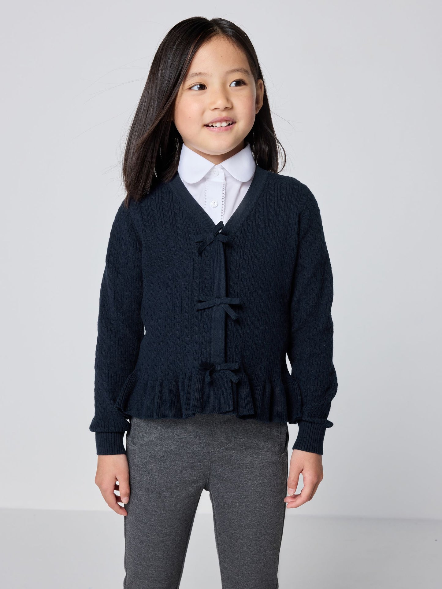 Dsiney Kidz - Clarks Navy Bow Front Knitted School Cardigan image 1