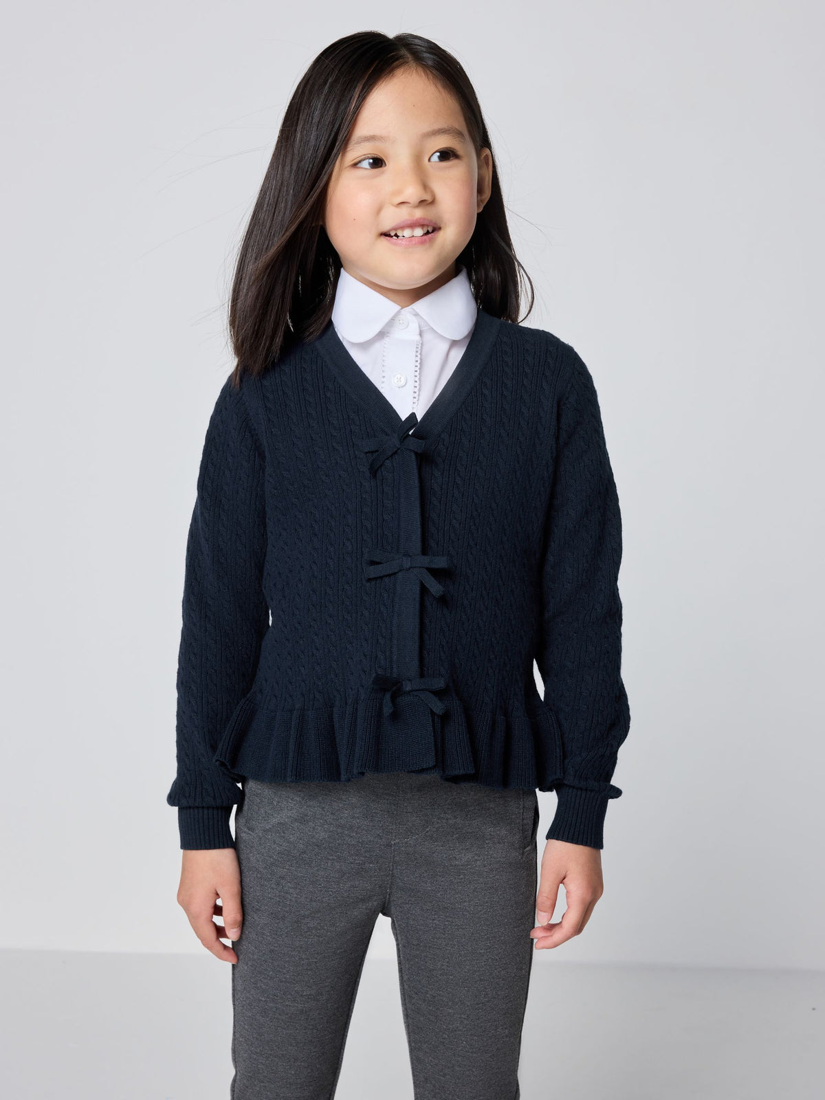 Dsiney Kidz - Clarks Navy Bow Front Knitted School Cardigan image 1