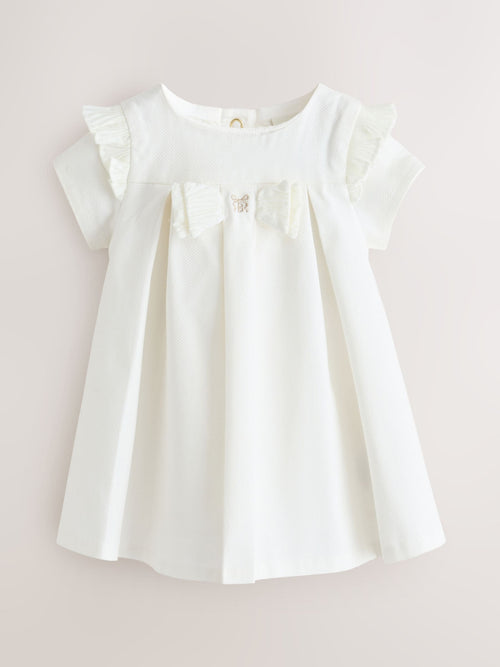 Dsiney Kidz - Baker by Ted Baker Cream Pique Pleated Woven Bow Detail Dress image 1