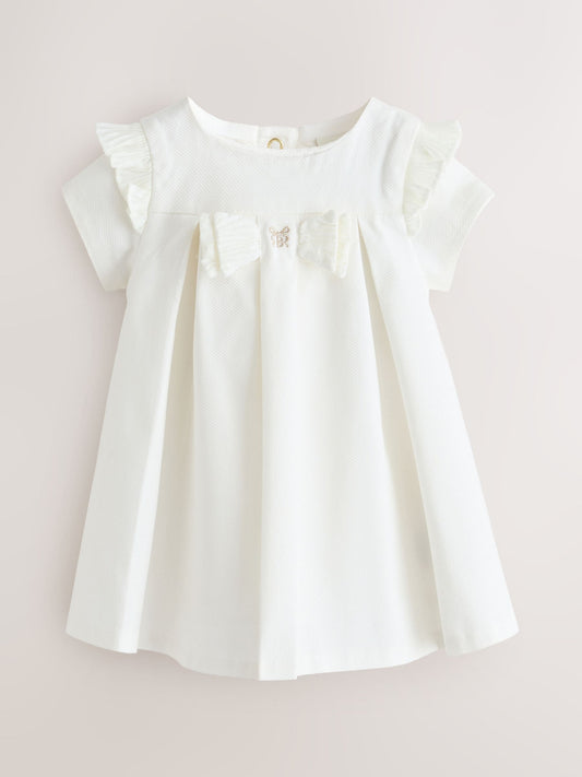 Dsiney Kidz - Baker by Ted Baker Cream Pique Pleated Woven Bow Detail Dress image 1