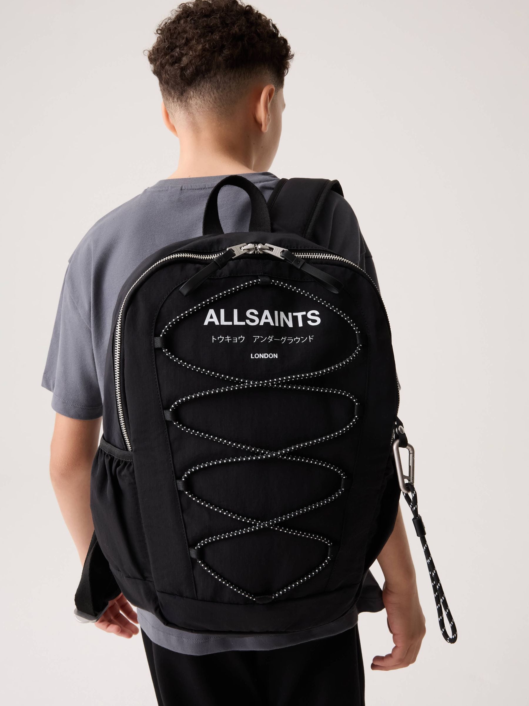 smALLSAINTS Black Back to School Undeground Logo Bungee Backpack image 1