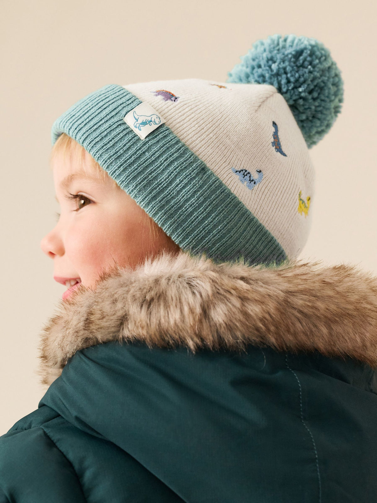 Dsiney Kidz - Ecru/Blue Dinosaur Embroidered Pom Beanie (3mths-16yrs) image 2