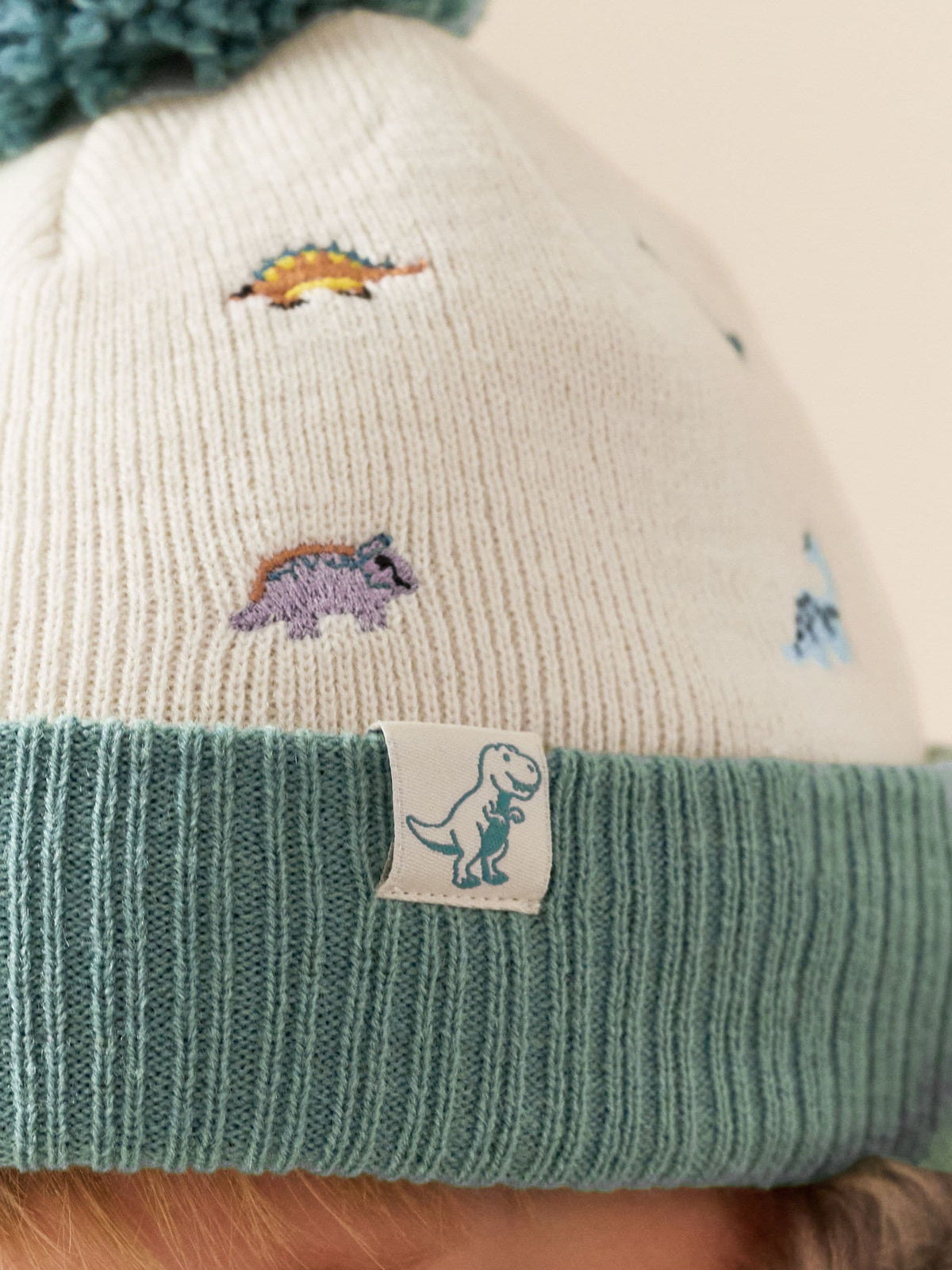 Dsiney Kidz - Ecru/Blue Dinosaur Embroidered Pom Beanie (3mths-16yrs) image 4