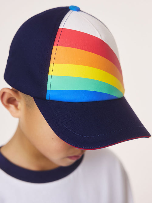 Little Bird by Jools Oliver Navy Rainbow Stripe Baseball Cap image 1