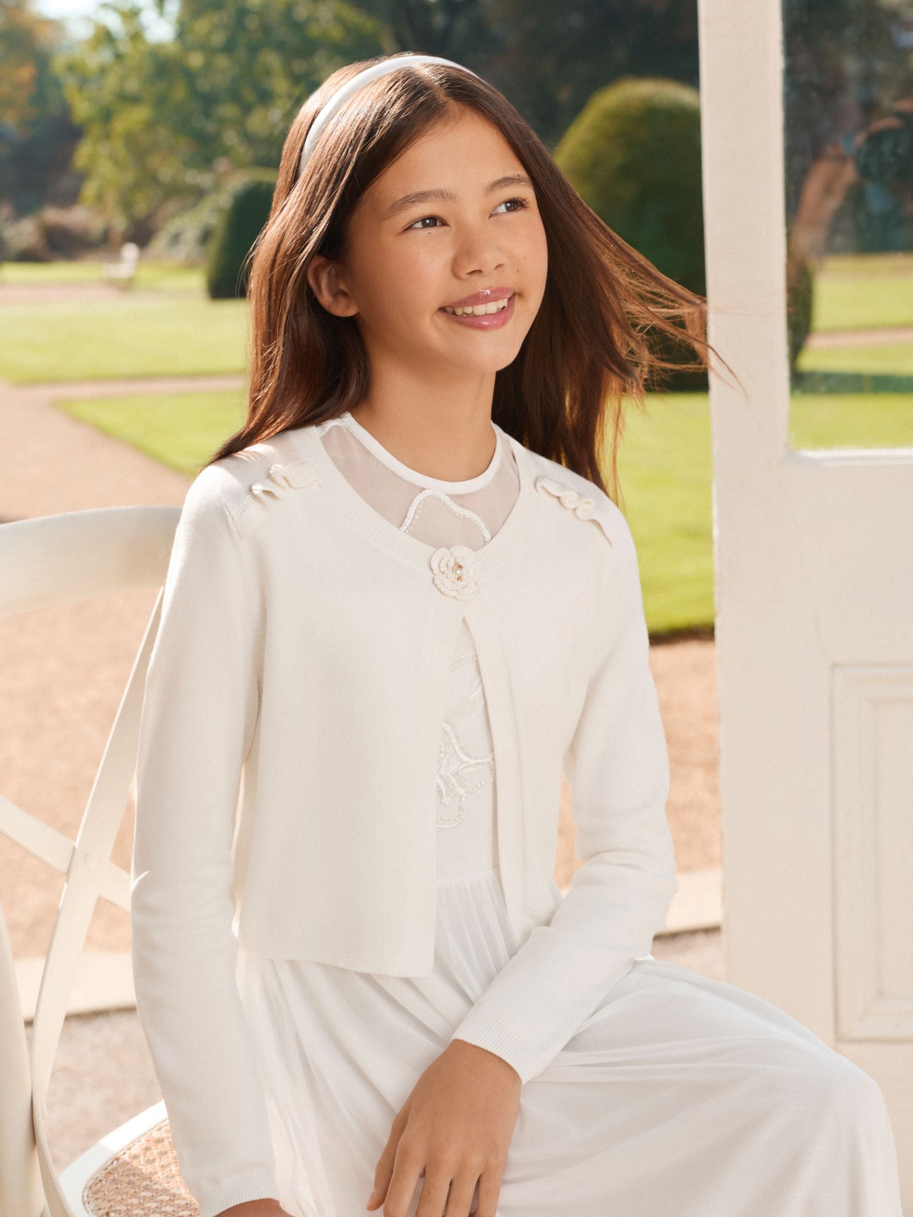 Dsiney Kidz - Lipsy Ivory Corsage Occasion Bolero Cardigan (5-16yrs) image 1