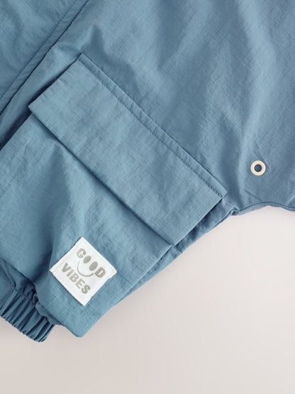 Light Blue Shower Resistant Anorak Jacket (3mths-7yrs)