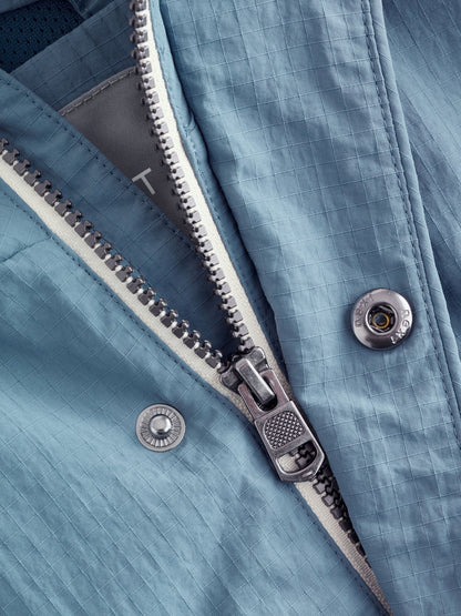 Light Blue Shower Resistant Anorak Jacket (3mths-7yrs)