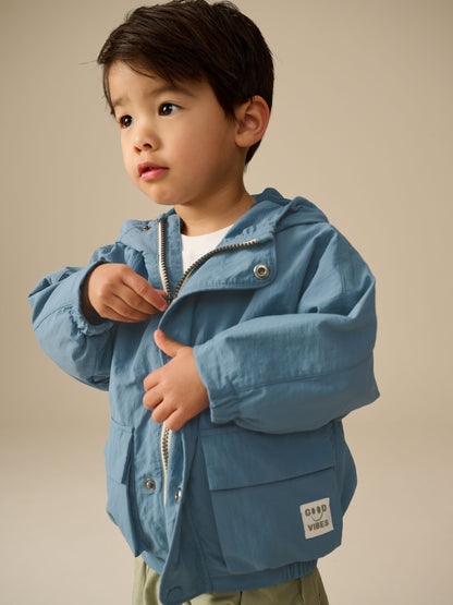 Light Blue Shower Resistant Anorak Jacket (3mths-7yrs)