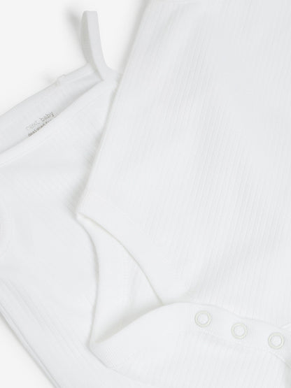 White 7 Pack Baby Strappy Bodysuits image 4