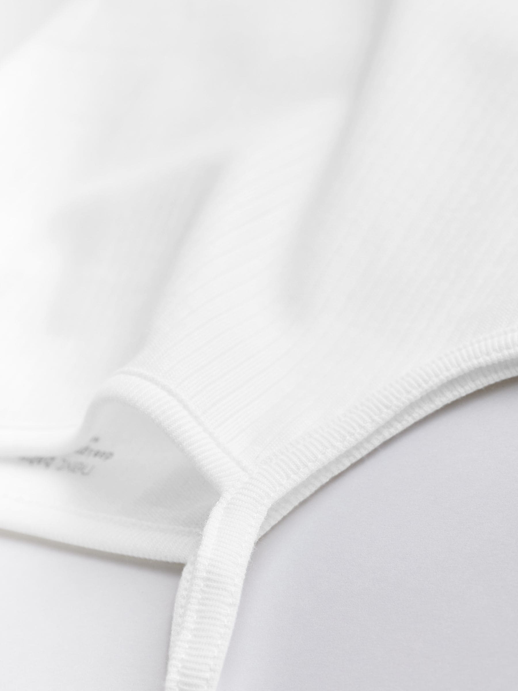 White 7 Pack Baby Strappy Bodysuits image 5