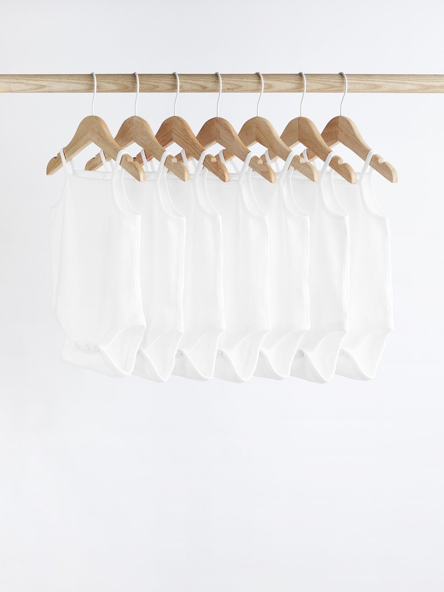 White 7 Pack Baby Strappy Bodysuits image 1