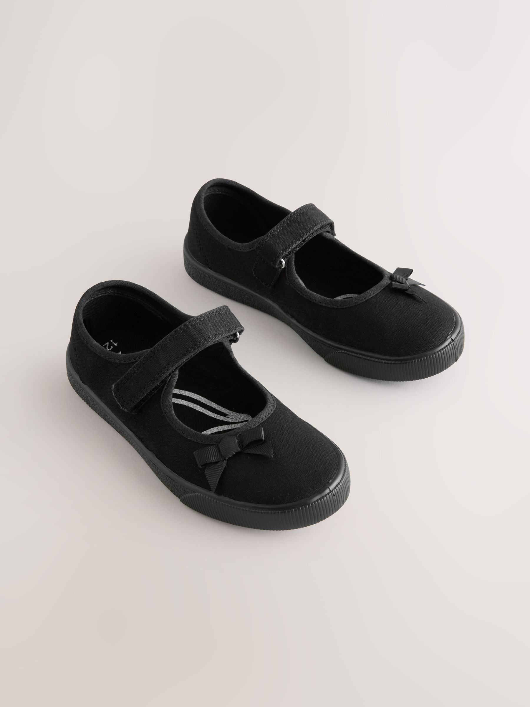 Black Wide Fit (G) School Bow Plimsoll Shoes image 1