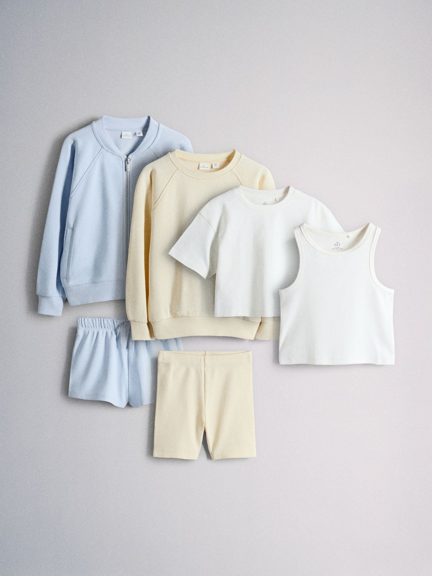 Dsiney Kidz - The Set 6 Piece Jersey Zip Through Bomber Crew Oversized T-Shirt Short Rib Vest and Cycling Shorts Set Blue/Yellow/White image 1