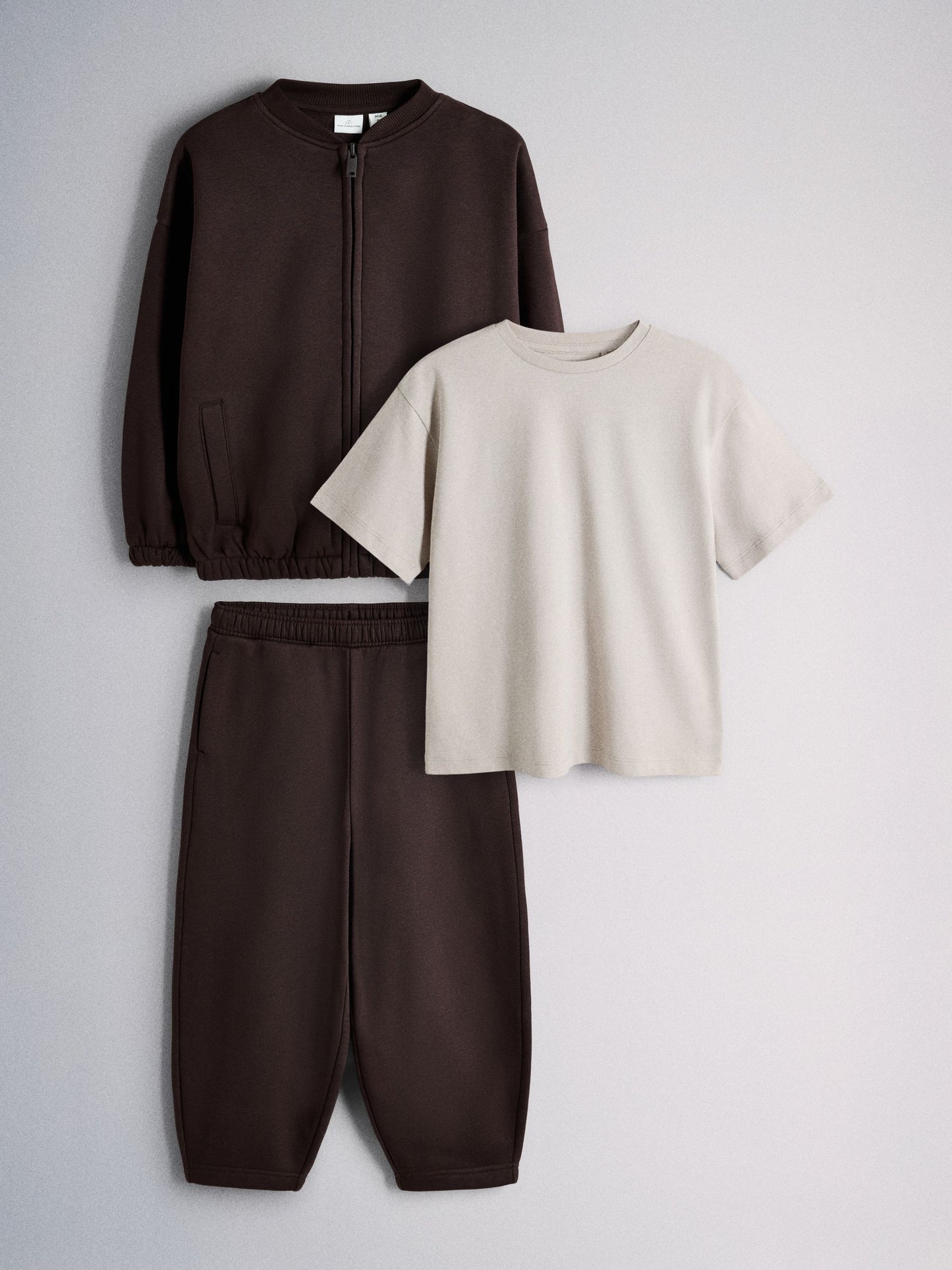 Dsiney Kidz - The Set 3 Piece Jersey Zip Through Bomber Short Sleeve Oversized T-Shirt and Barrel Jogger Set Chocolate Brown/Cream image 1