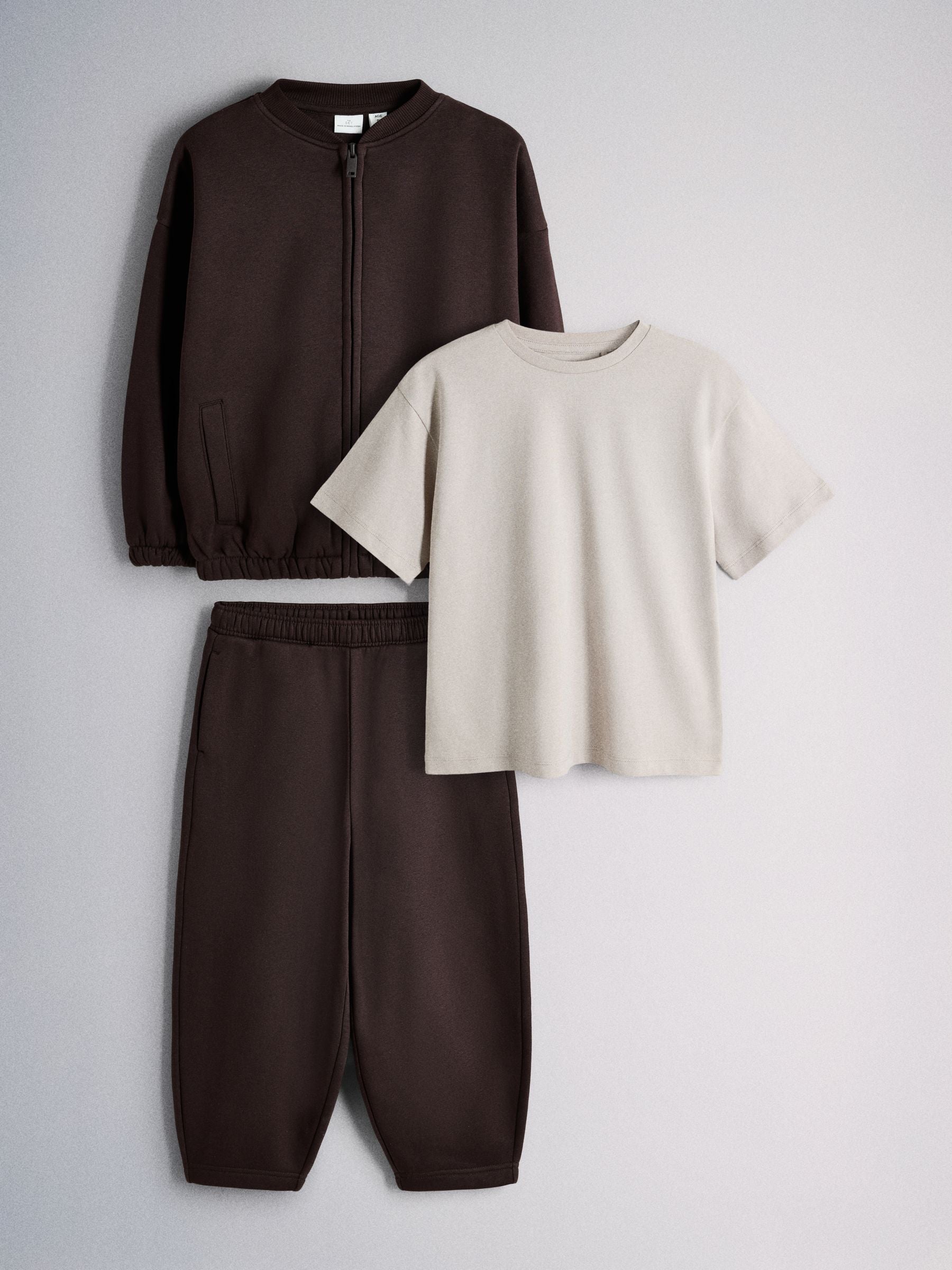 Dsiney Kidz - The Set 3 Piece Jersey Zip Through Bomber Short Sleeve Oversized T-Shirt and Barrel Jogger Set Chocolate Brown/Cream image 1