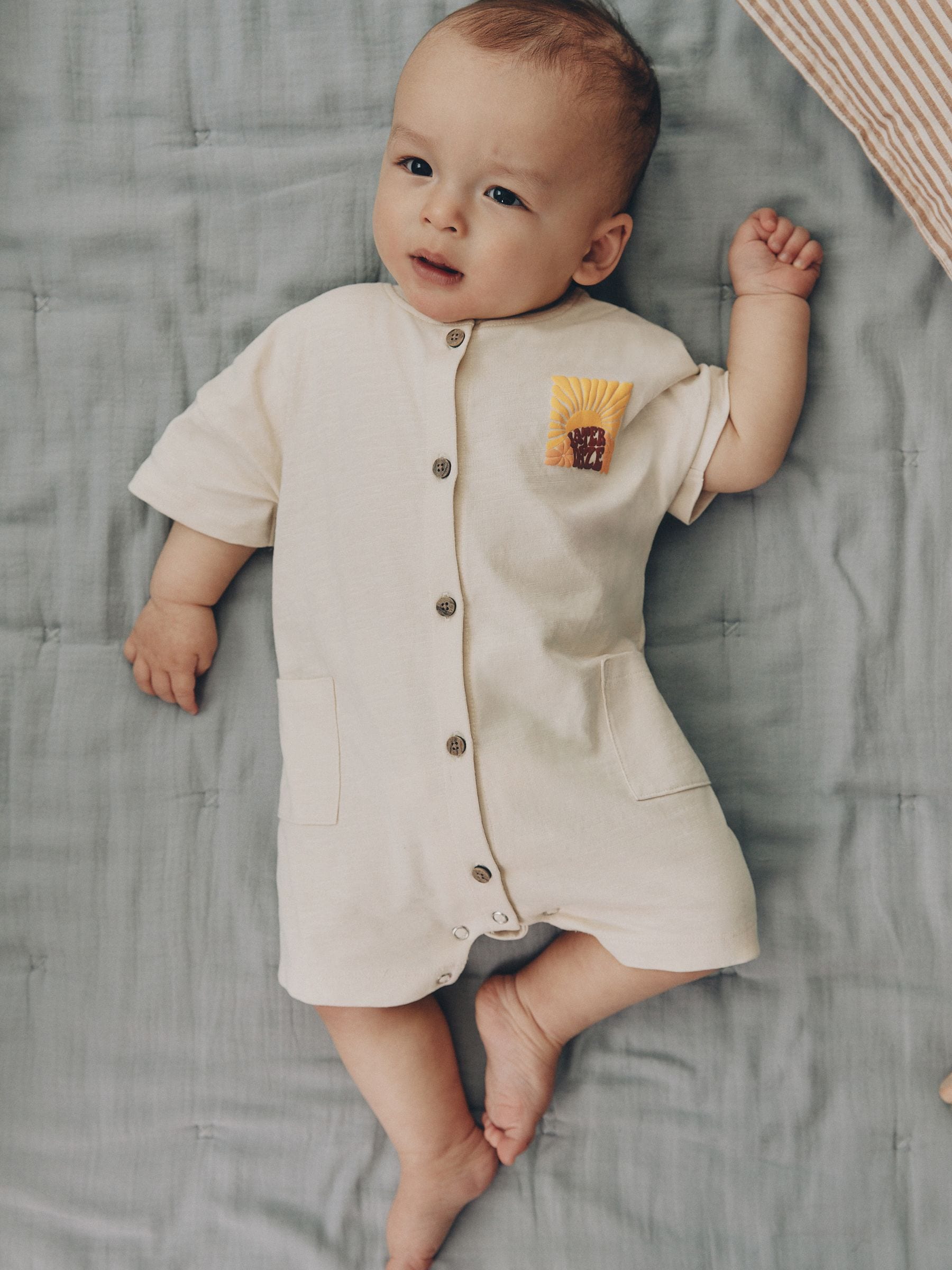 Neutral Sunshine Seminal Printed Button Through Baby Romper image 2