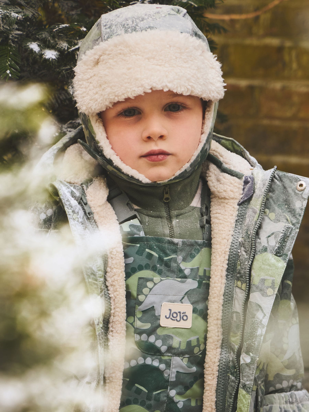 JoJo Maman Bébé Green Dinosaur Cosy Trapper Hat - image 1