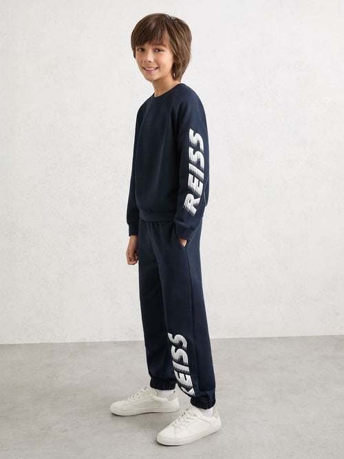 Reiss Navy Ruff 3-9 yrs Cotton Logo-Print Cuffed Joggers image 1