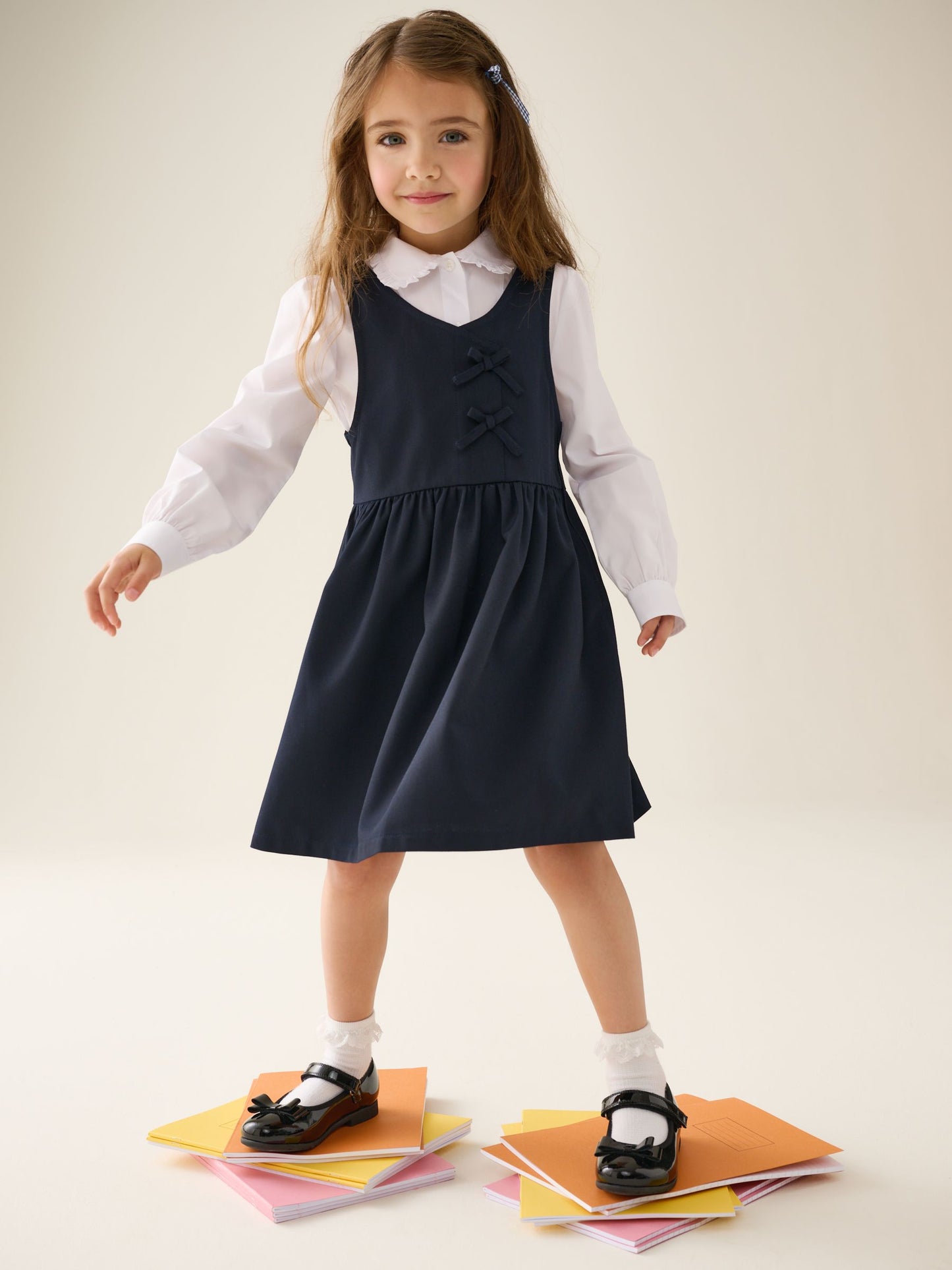 Navy Blue Asymmetric Bow Front School Pinafore Dress (3-14yrs) image 1