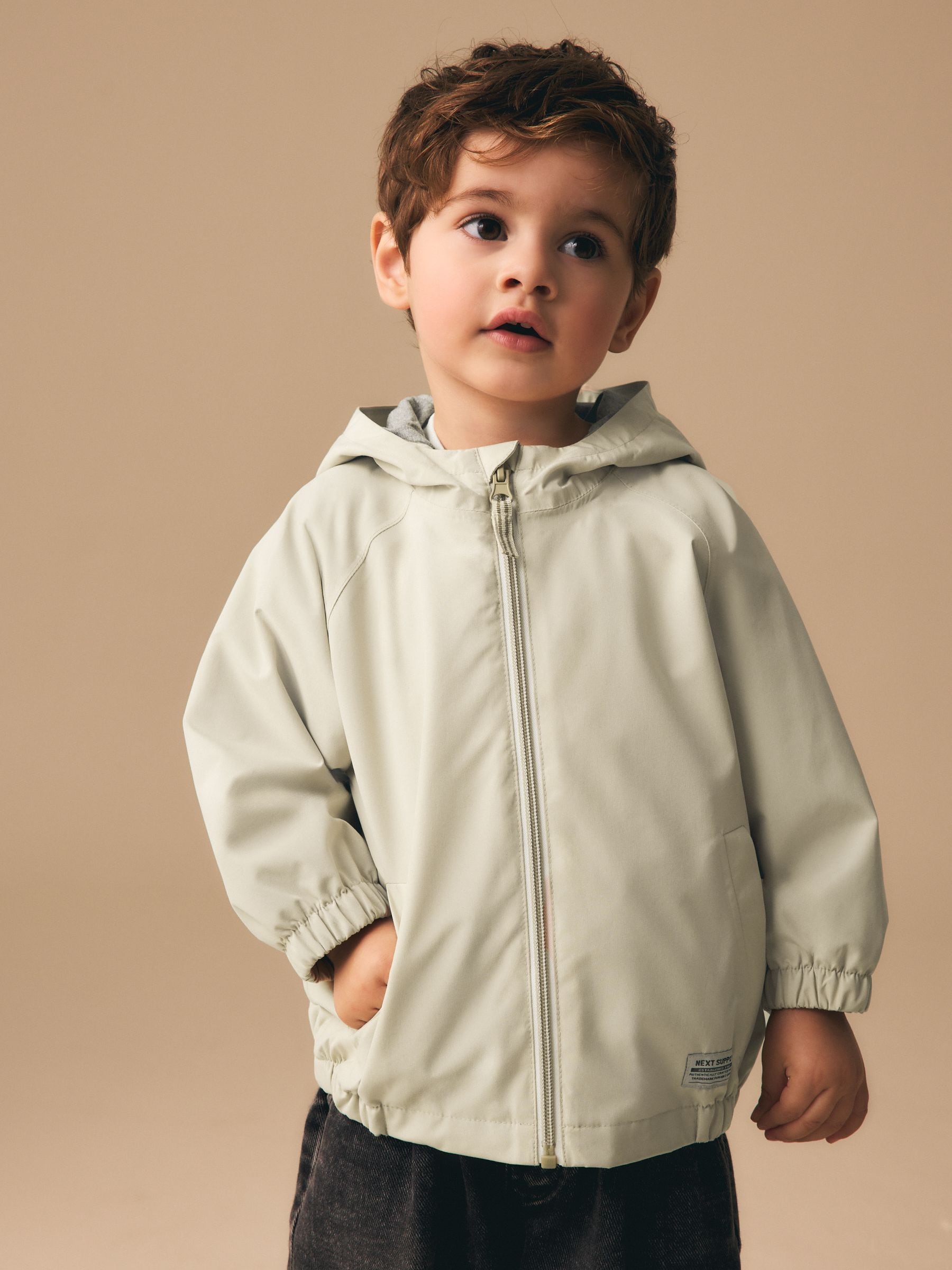 Dsiney Kidz - Buttermilk Waterproof Cagoule Jacket (3mths-7yrs) image 1