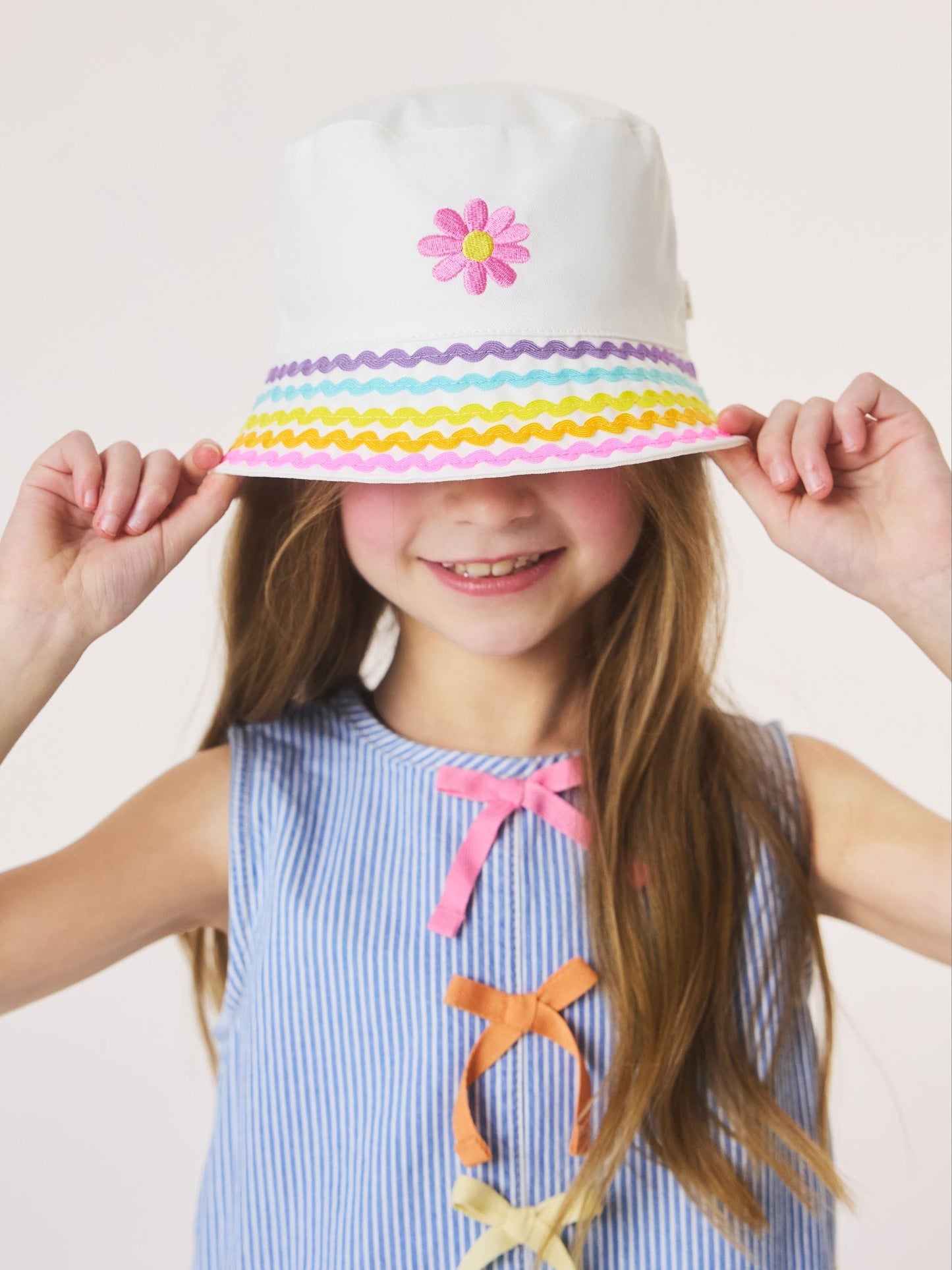 Little Bird by Jools Oliver White Pastel Rainbow Rik Rak Bucket Hat image 1