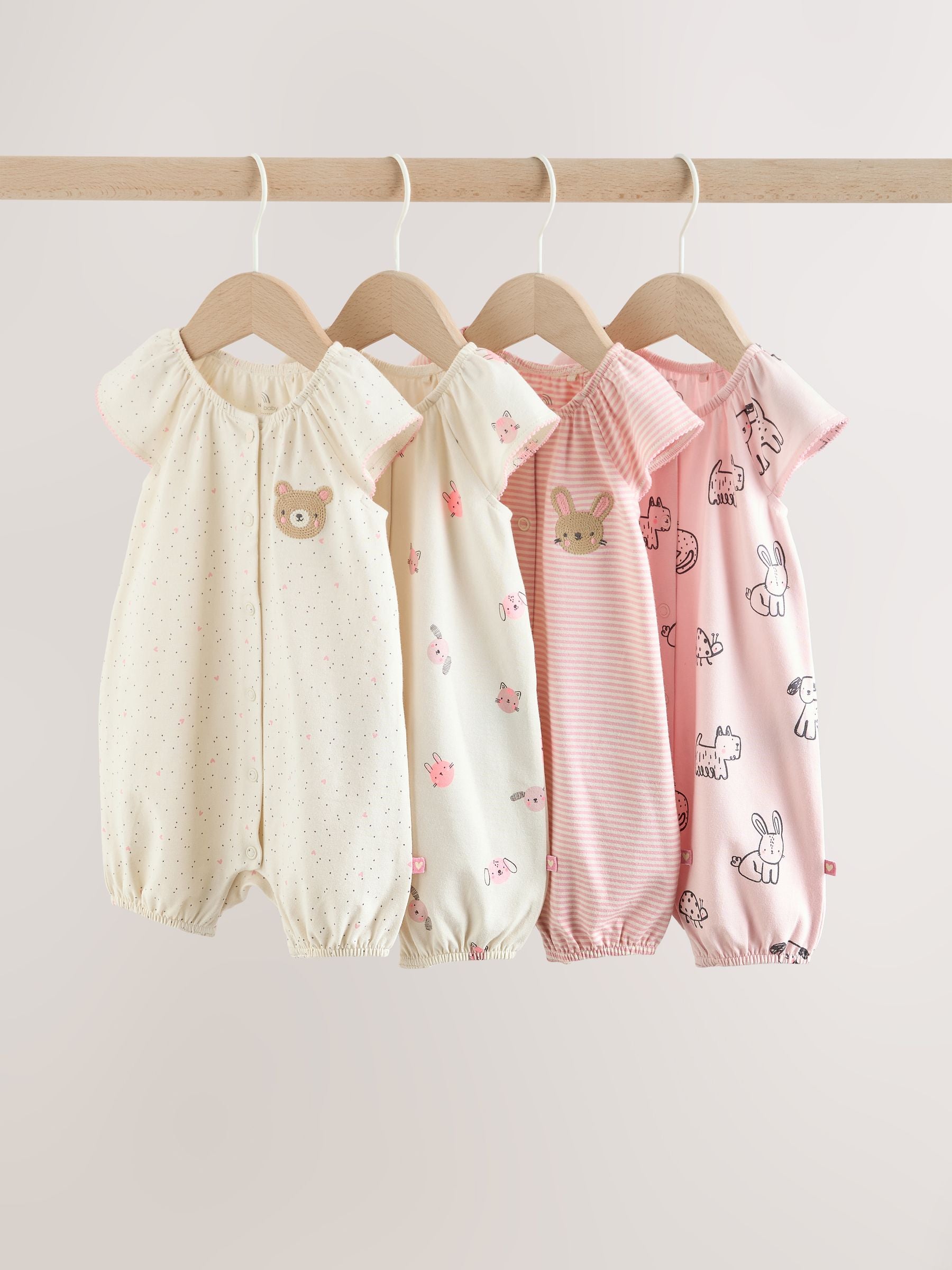 Pink Character All Over Printed Button Through Jersey Baby Rompers 4 Pack image 1