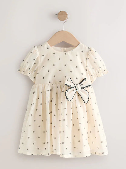 Ecru Spot Bow Dress (3mths-8yrs)