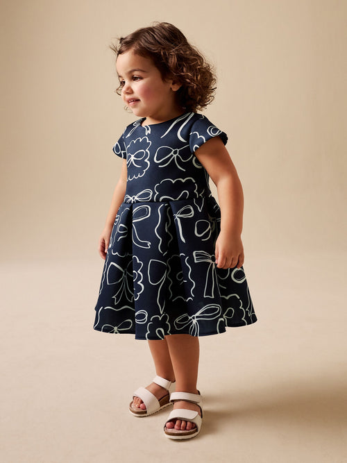 Dsiney Kidz - Navy Bows Scuba Occasion Dress (3mths-7yrs) image 1