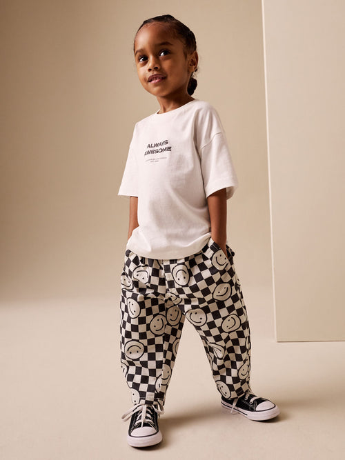Black/Neutral Happy Face Checkerboard Barrel Pull On Trousers (3mths-7yrs) image 1