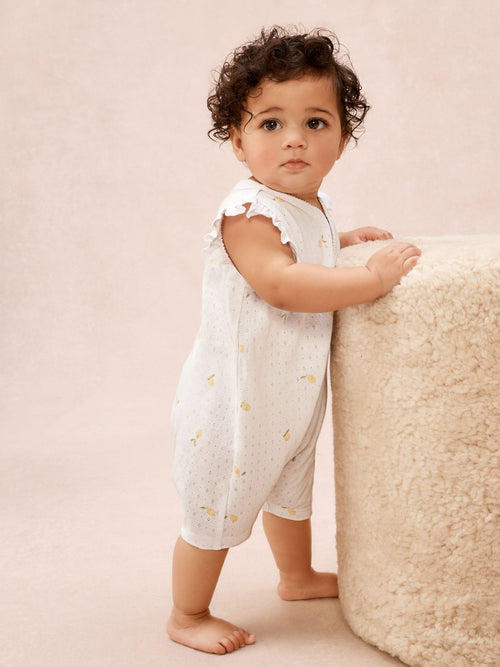 The White Company White Cotton Pointelle Lemon Rompersuit image 1